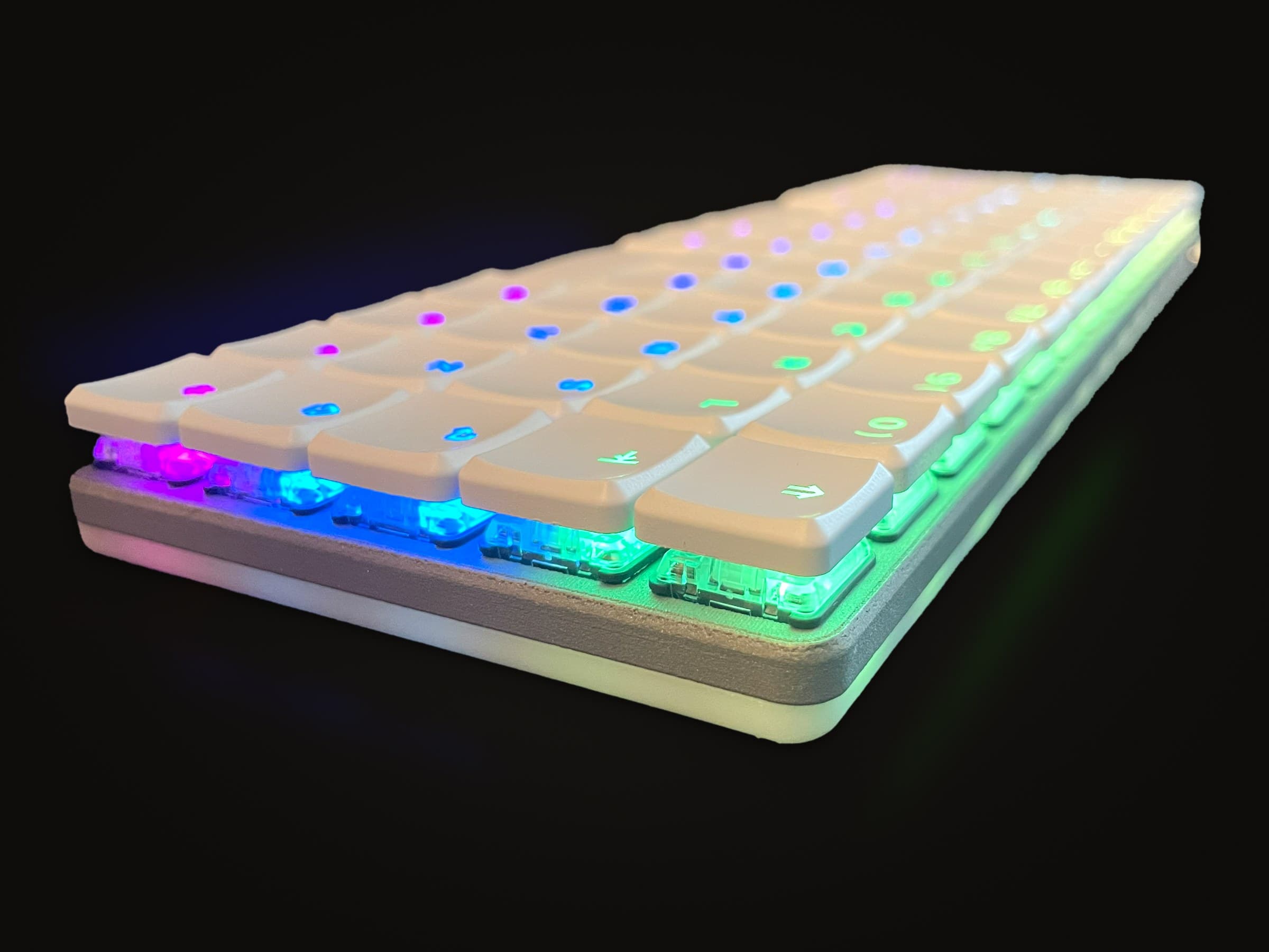 The Breeze V1 from a low angle at one end, the RGB glowing through its switches.